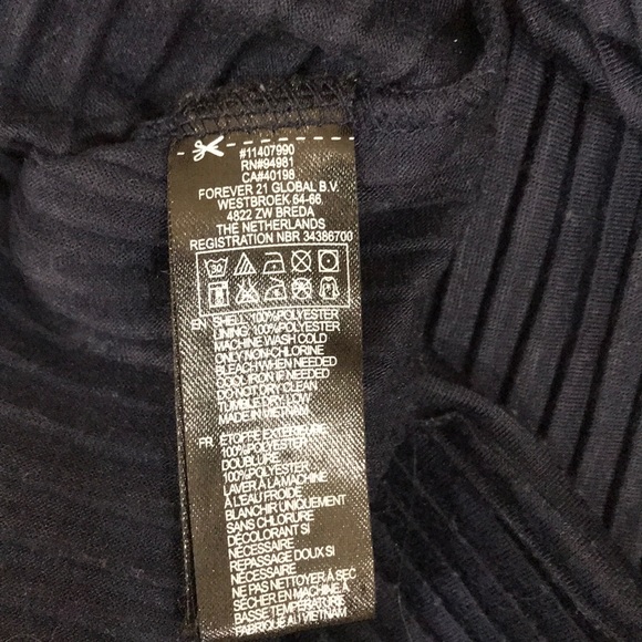 Navy top by Xai. Size Large - Picture 8 of 8